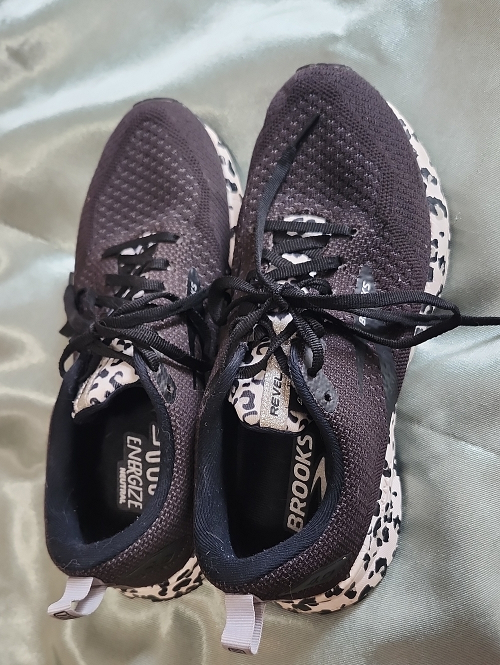 Brooks Women's Revel 4 Black Knit Running Shoes with White Leopard-Print Sole